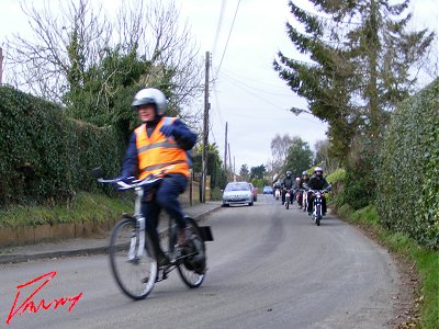 Cyclemaster leading a group of mopeds