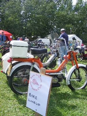 Mopeds lined up at Stonham Barns