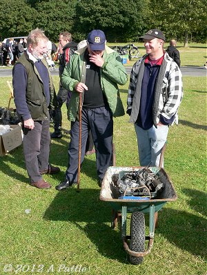 Ray and Mark with a wheelbarrow load of Cyclemaster engines