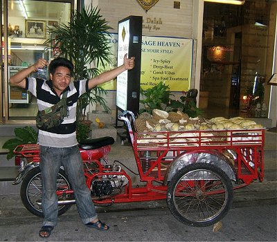 Thai trade trikes: this one sells Durian, which smells awfull but tastes like cream & custard