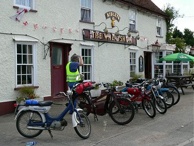 Some of the bikes lined up outside the Wheatsheaf