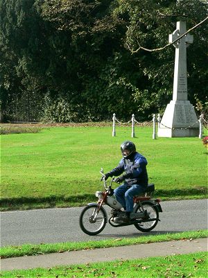 A Garelli passes the War Memorial