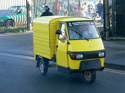 A waving Ape driver