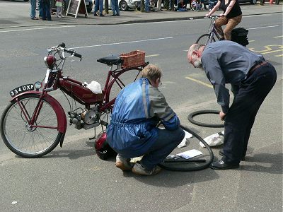 Ralph enlists the puncture repairing skills of the local vicar