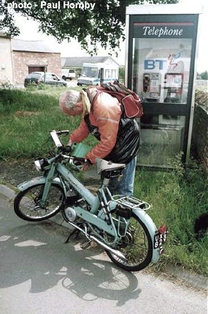 Calvin Selvey refuels his 1952 Follis