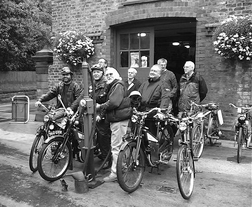 In front of Paul Adams’s Cycle Museum