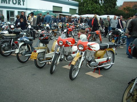 John’s and Mike’s bikes mingle with the locals