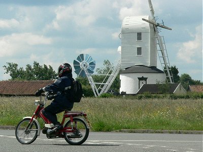 John riding a Honda Novio