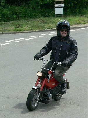 Paul Daniels on a Solo moped