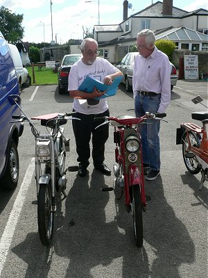 The Nippy goes to a new owner: Lindsay and Keith do the paperwork