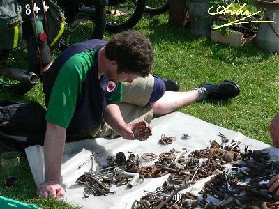 Richard carefully selects a sprocket from the jumble...