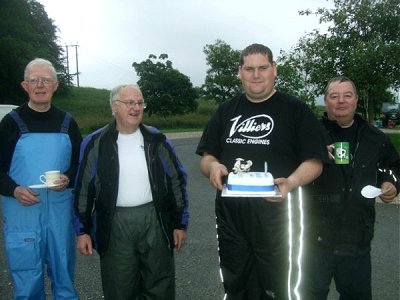 Glen is presented with a birthday cake