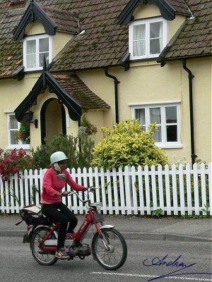 Anya rides her Puch Maxi