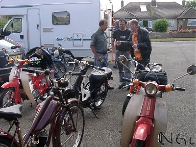 Paul explains things to Lawrence and Carl