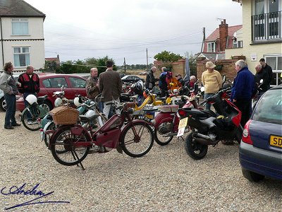 Bikes and riders outside the Victoria