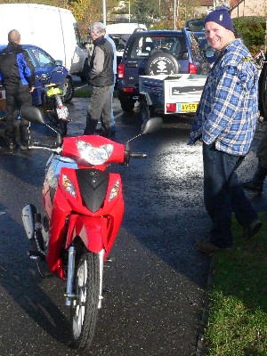 Mark Gibb with a Kymco Nexxon 50