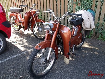 A pair of bronze Mobylettes