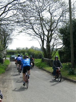 Lindsay studiously ignores a group of cyclists