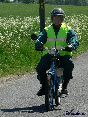 Keith rides off on his Honda