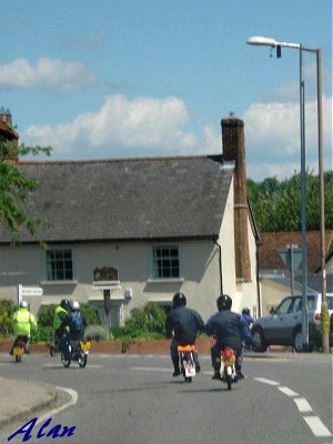 Riding through a village