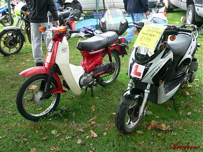 A Honda 90 and a Chinese Dafier scooter