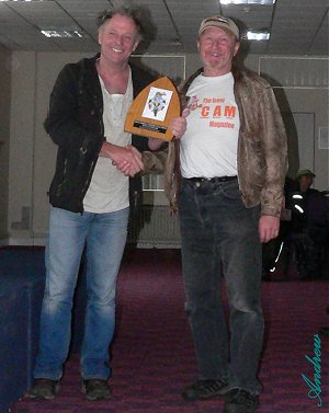 Danny collects the award from Nick Sanders