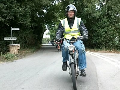 Carl riding a Motobi