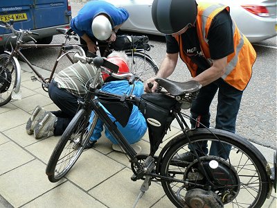 Peter trying to fix the brakes on the tandem - and the only other Cyclemotor on the run