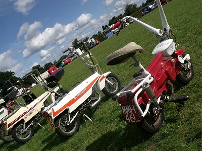 Three folding mopeds