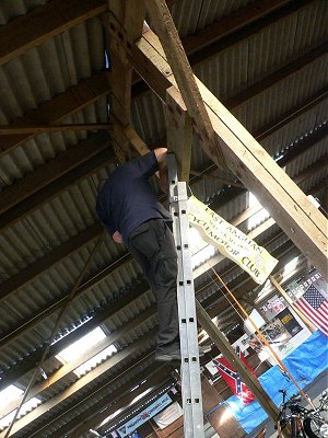 Paul hangs the banner
