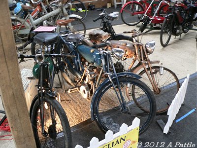 Three pre-war Peugeot vélomoteurs