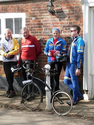 Cyclists—and a Crypto—loitering outside a pub